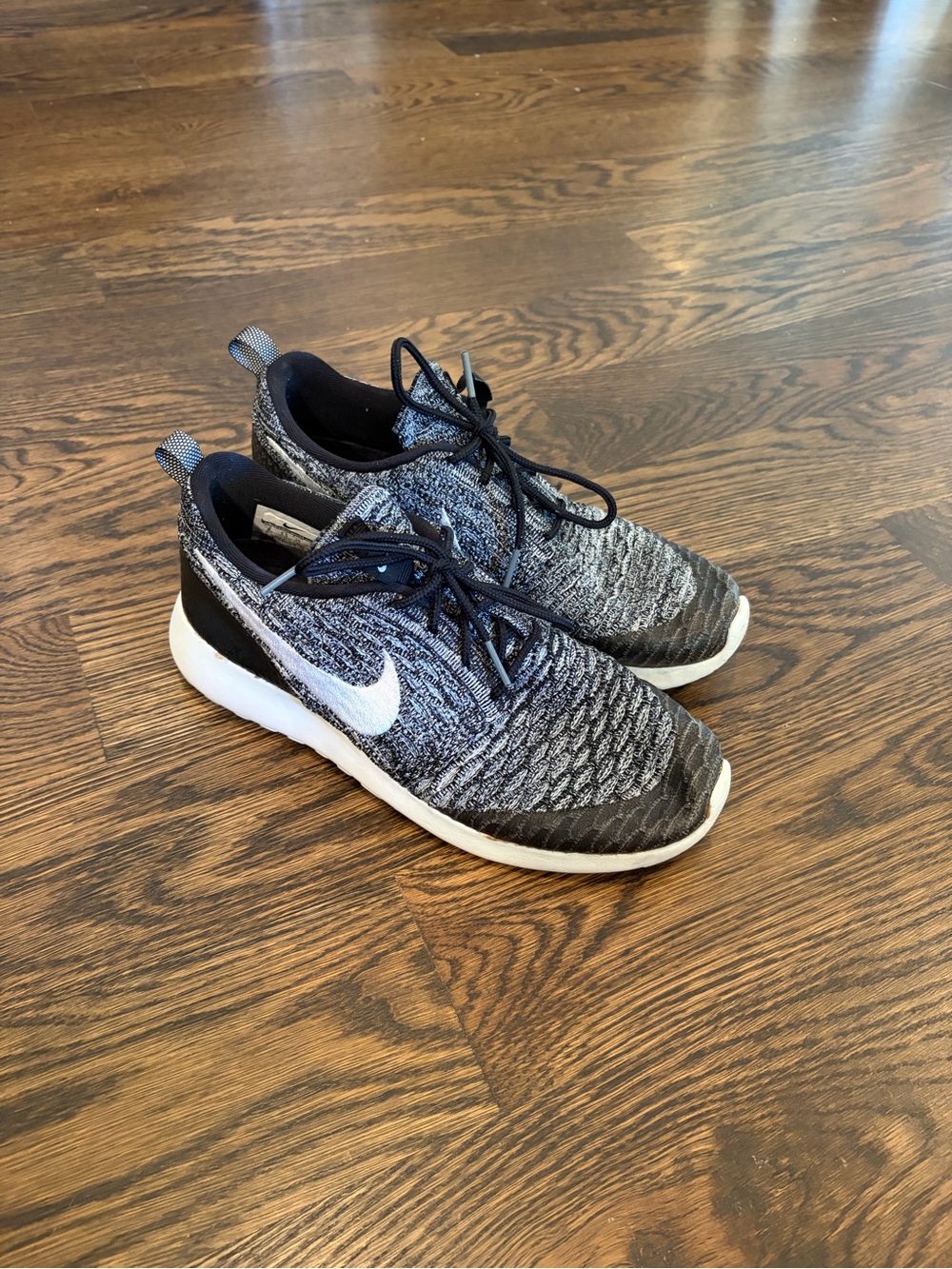 Nike Women's Black and Gray Knit Sneakers with White Swoosh